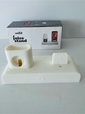 Brand new Ankit Juice Stand 3 in 1 charging dock silicone stand in white.